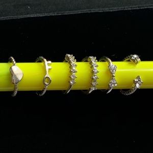 6 silver tone midi rings, some w clear rhinestones